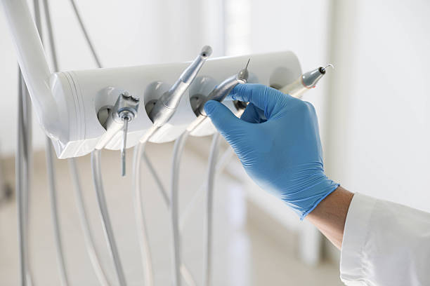 Professional Tooth Extraction technician working in Gamewell, NC